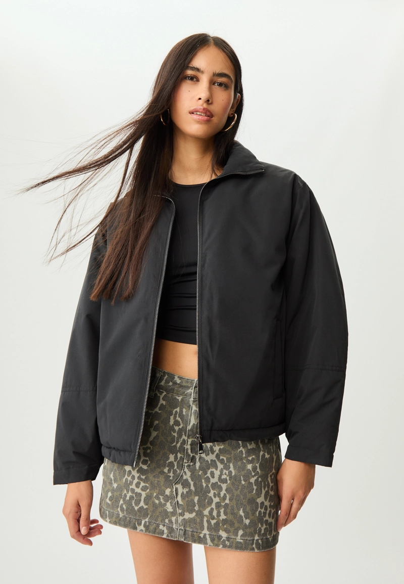 Стеганая куртка с высоким воротником