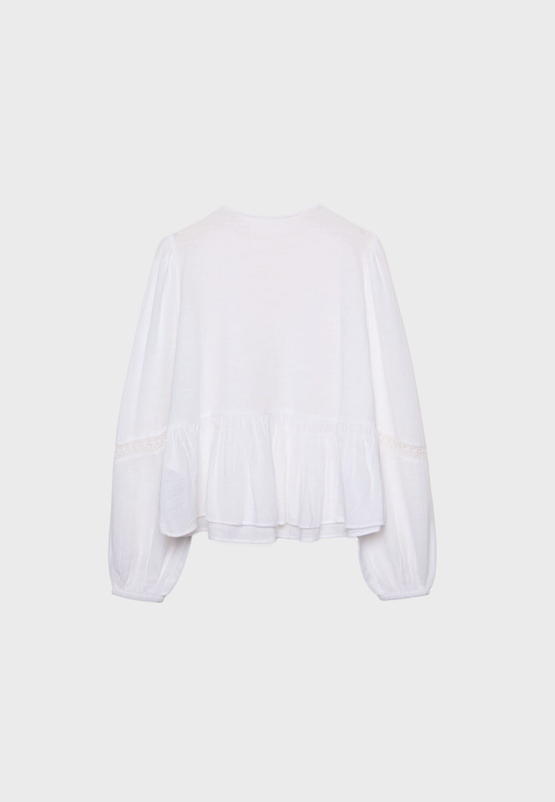 Свободная блузка с вышивкой