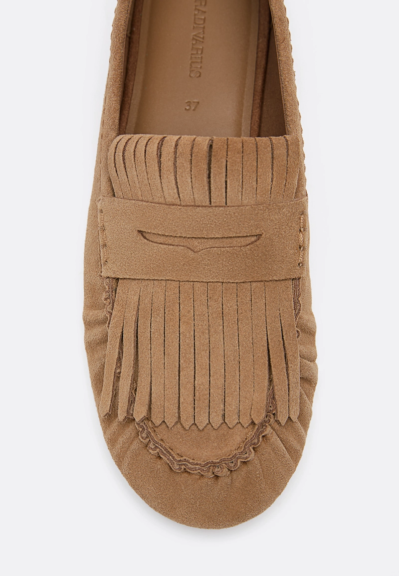 Кожаные мокасины с бахромой