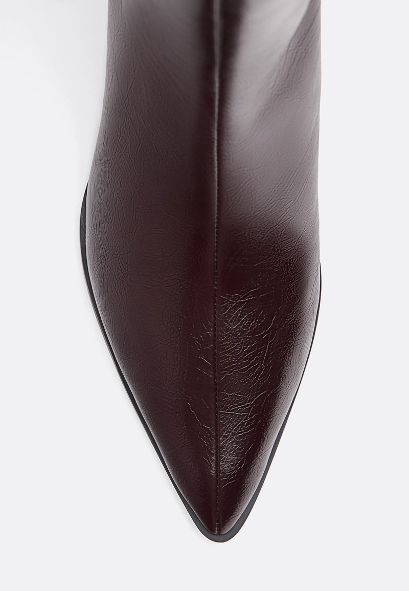 Сапоги на среднем тонком каблуке