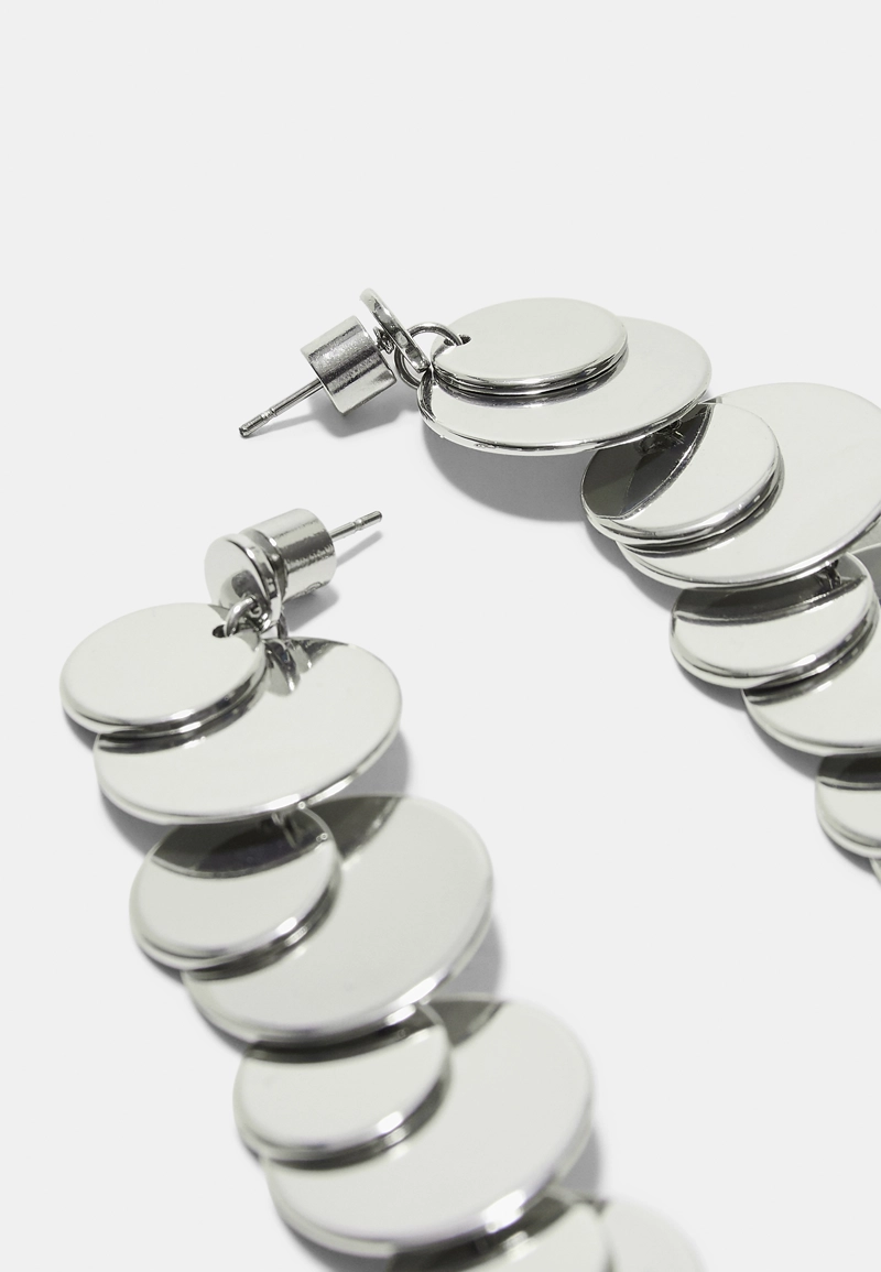 Длинные серьги овальной формы