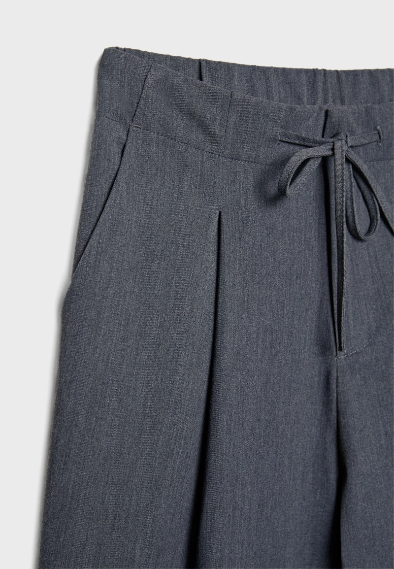 Умные брюки с линиями и завязками