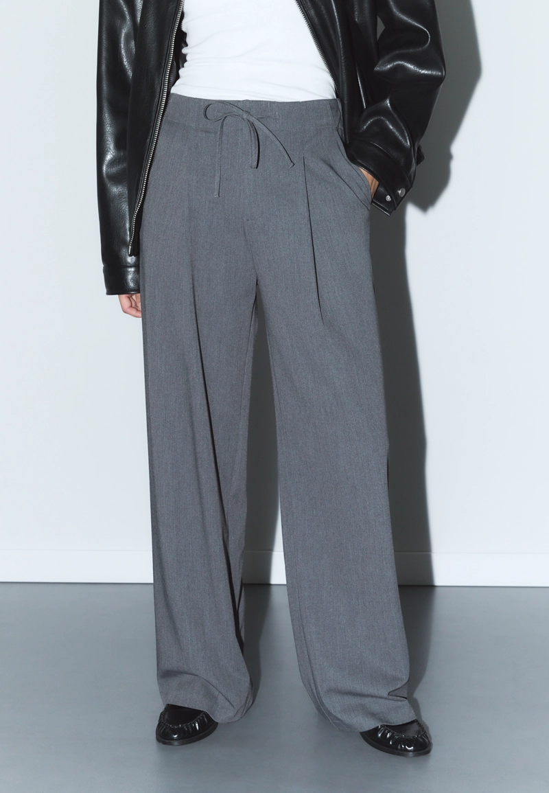 Умные брюки с линиями и завязками