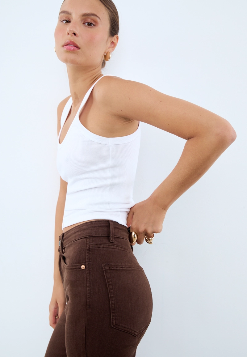 D74 Брюки клеш из эластичной ткани с разрезом