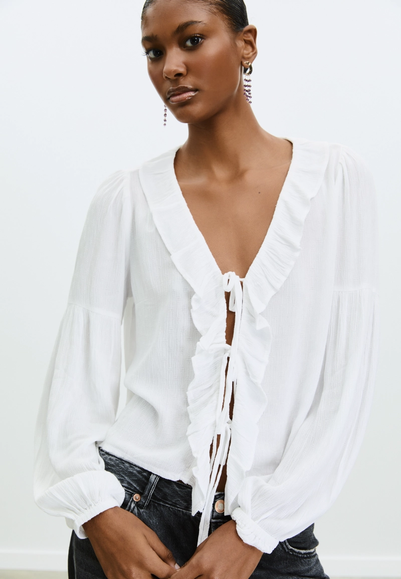 Блузка с воланами