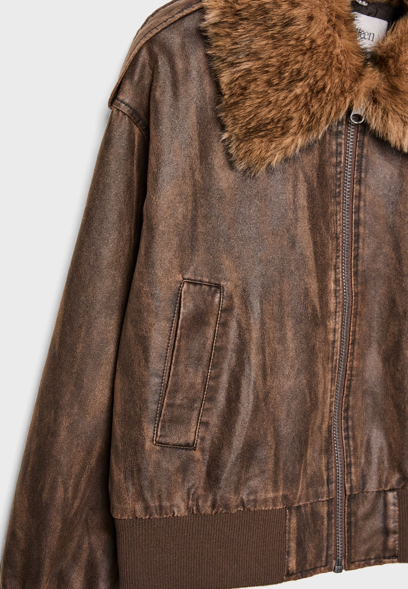 Укороченная комбинированная куртка из искусственного меха