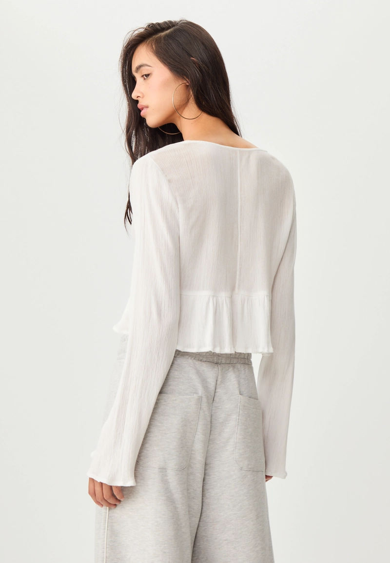 Блузка с оборками и завязками