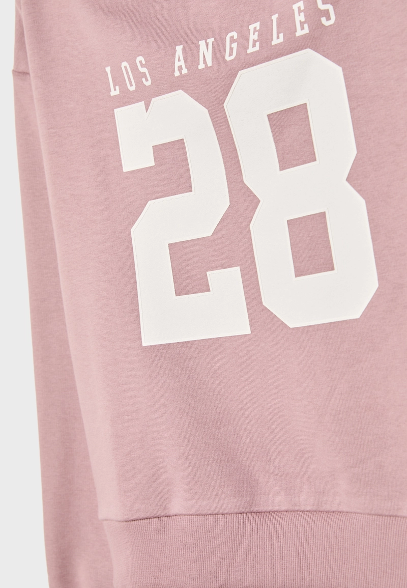 Толстовка с графическим вырезом на плече