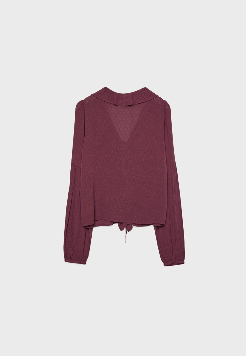 Блузка с воланами