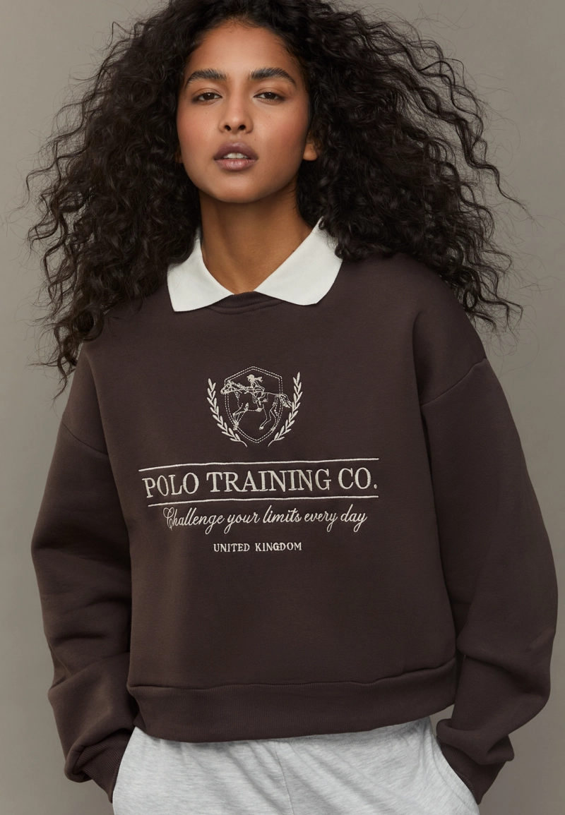 Вышитая толстовка с воротником поло