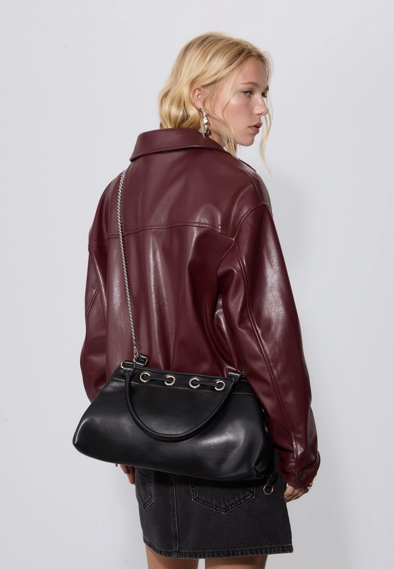 Сумка на плечо с люверсами