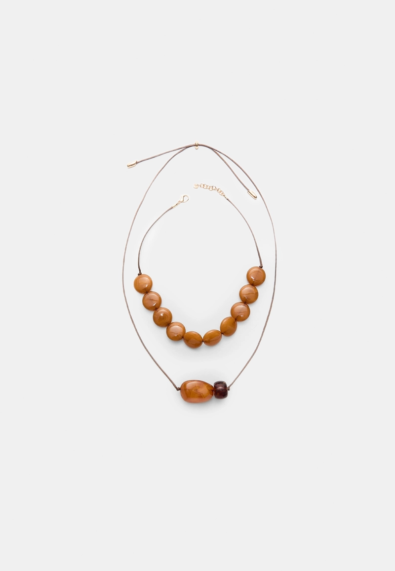 Набор из 2 колье на шнурке с бусинами