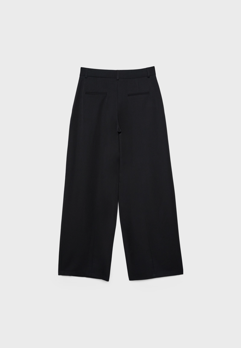 Классические брюки с защипами