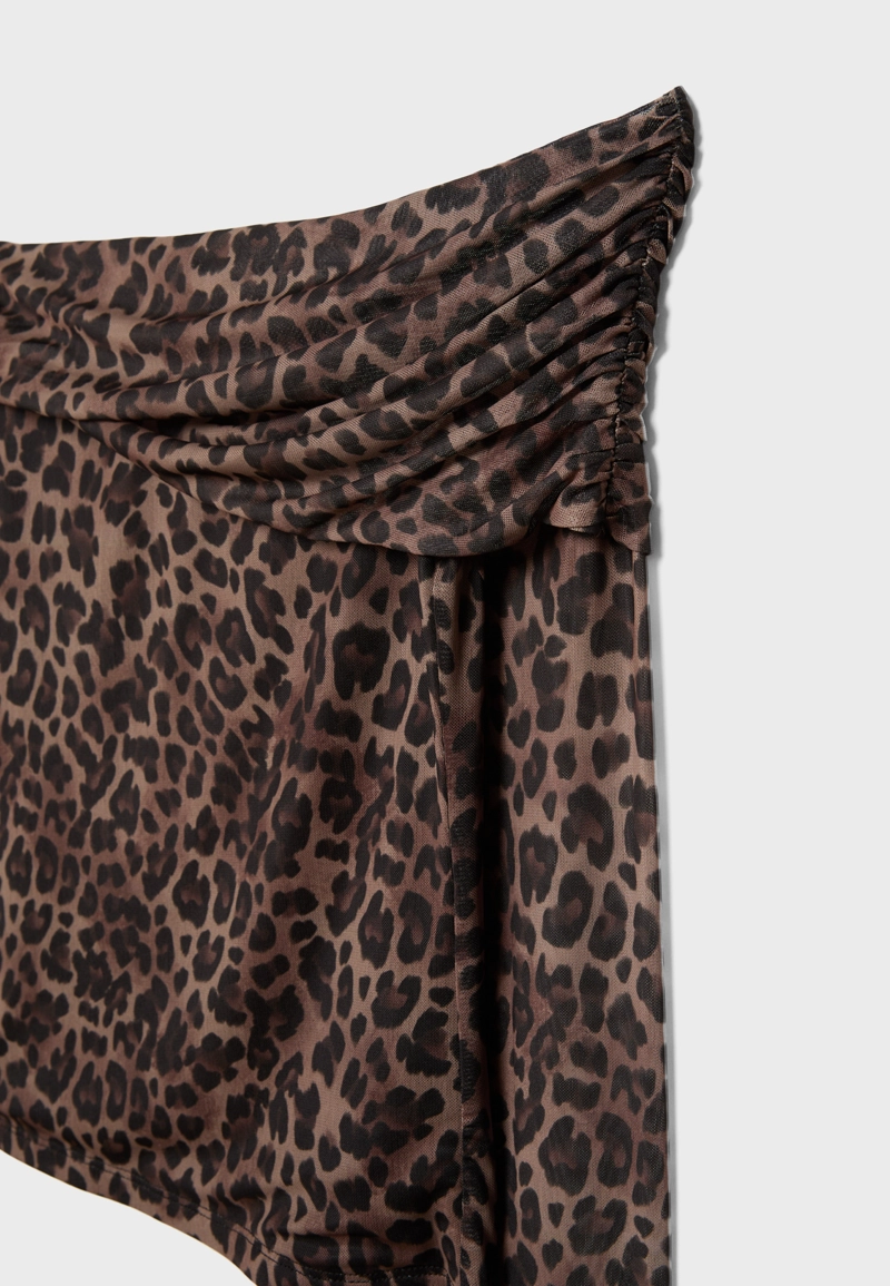 Асимметричная футболка из полупрозрачной ткани с принтом