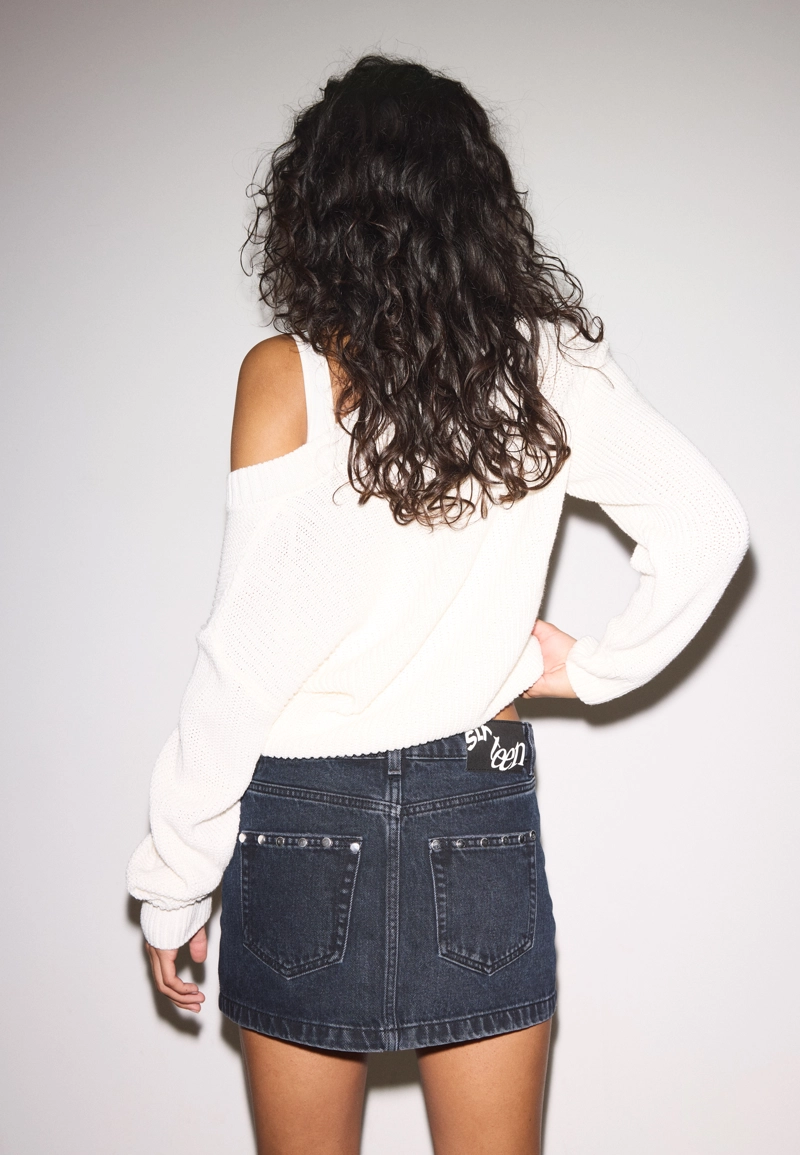 Джинсовая юбка с заклепками