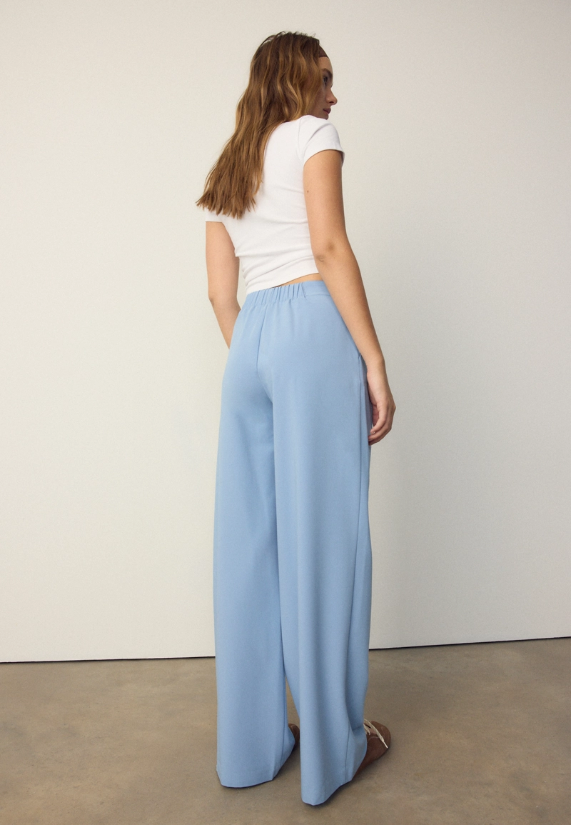 Широкие брюки с пряжкой