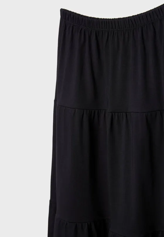 Длинная трикотажная юбка свободного кроя