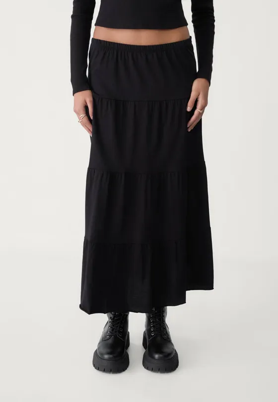 Длинная трикотажная юбка свободного кроя