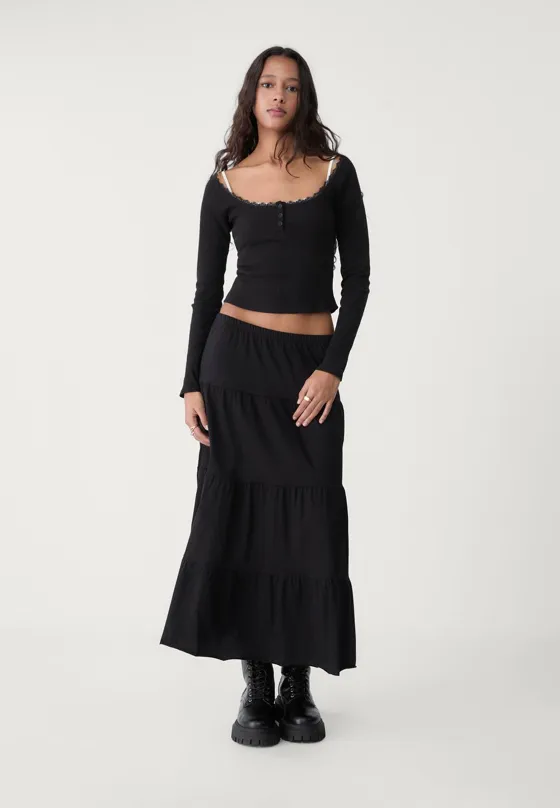 Длинная трикотажная юбка свободного кроя