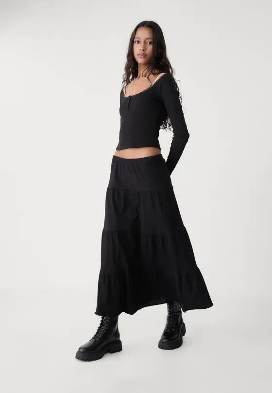 Длинная трикотажная юбка свободного кроя