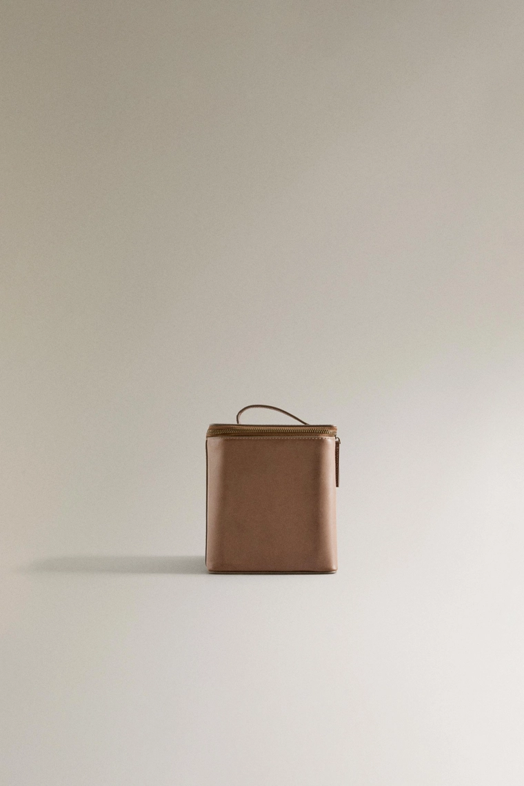 Большая кожаная косметичка