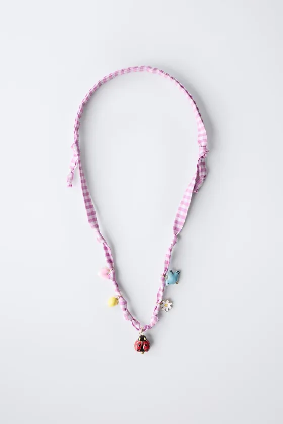 Ожерелье с клетчатым узором и бисером