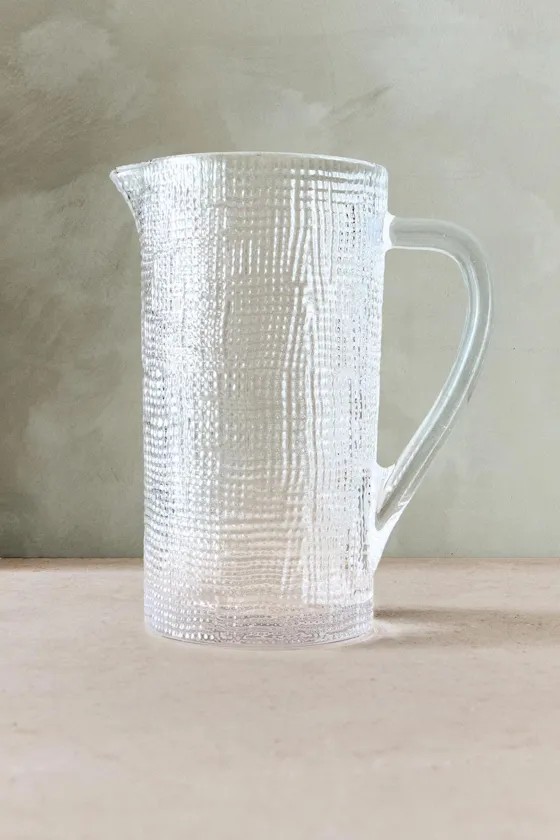 Стеклянный кувшин с рельефным узором