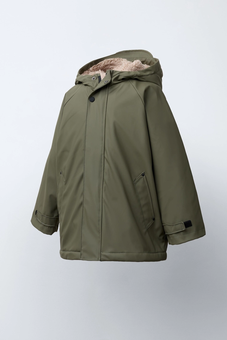 ПРОРЕЗИНЕННАЯ КУРТКА WATER REPELLENT НА ИСКУССТВЕННОЙ ОВЧИНЕ