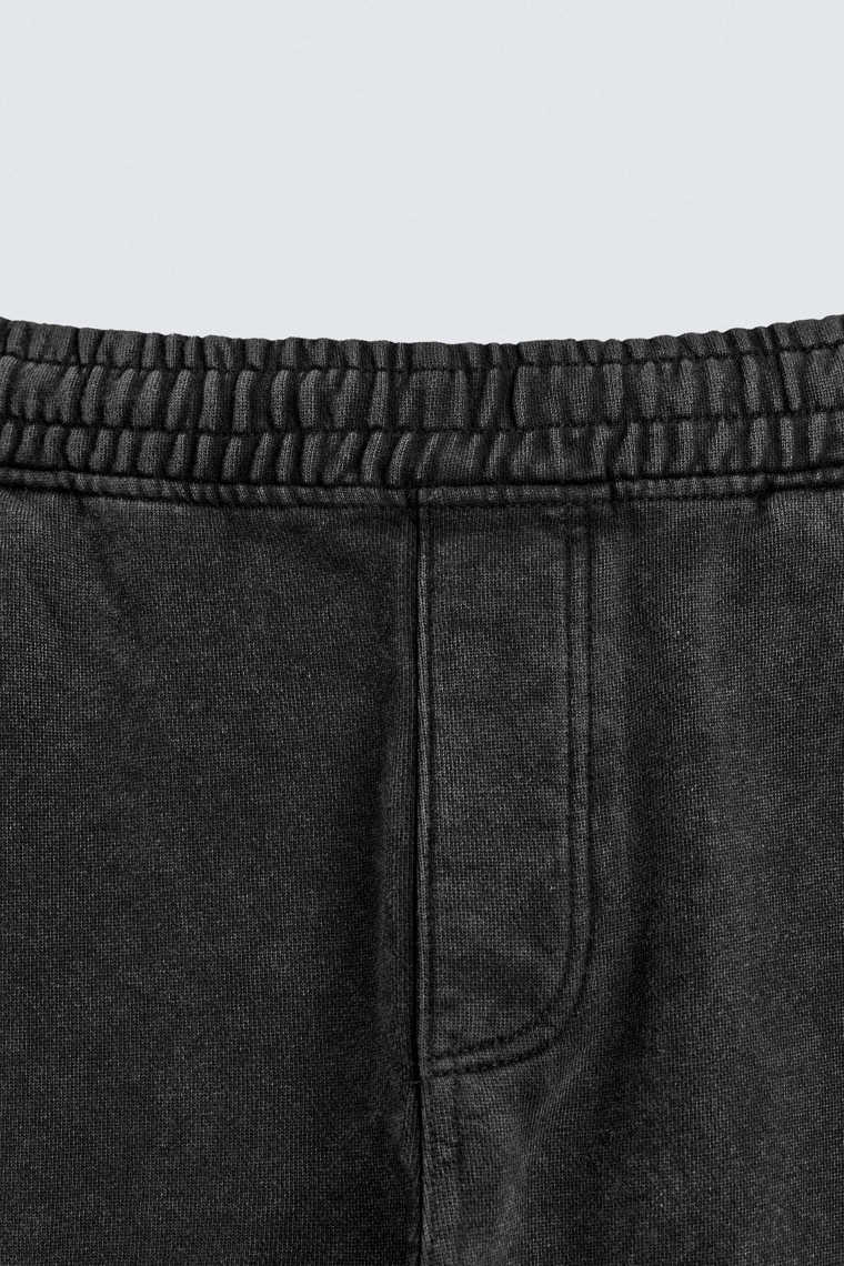 ДЖОГГЕРЫ WIDE-LEG С ЭФФЕКТОМ ПОТЕРТОСТИ