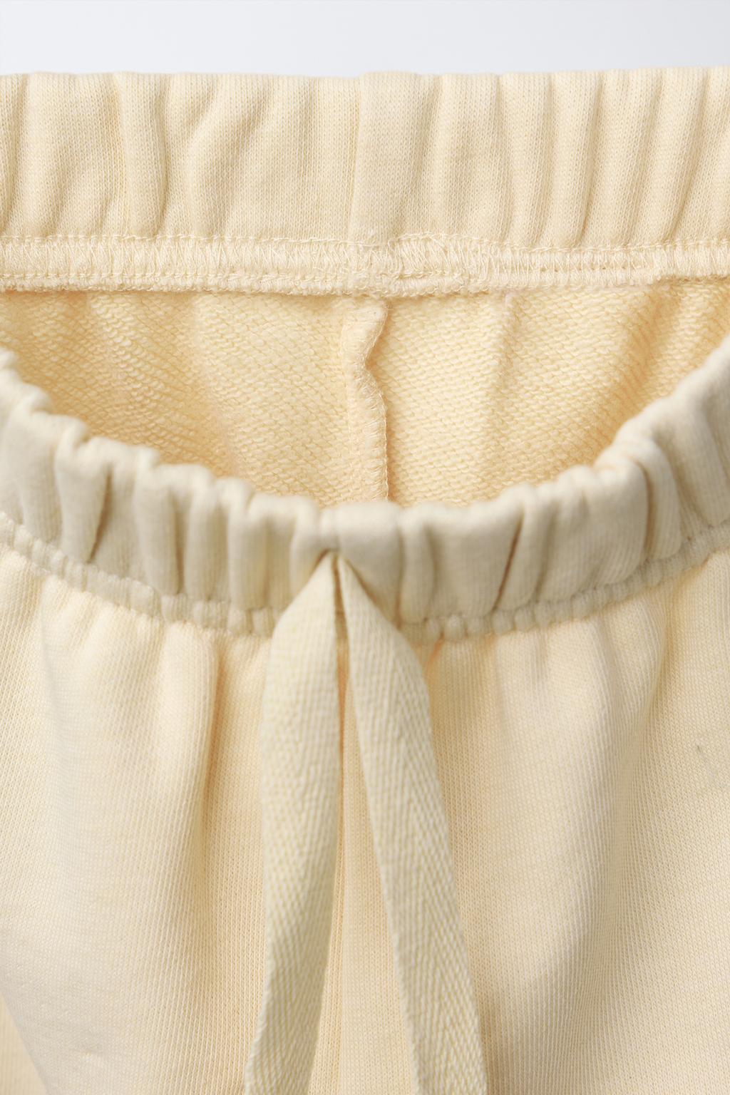 БРЮКИ-ДЖОГГЕРЫ С КАРМАНОМ-СЕРДЦЕМ