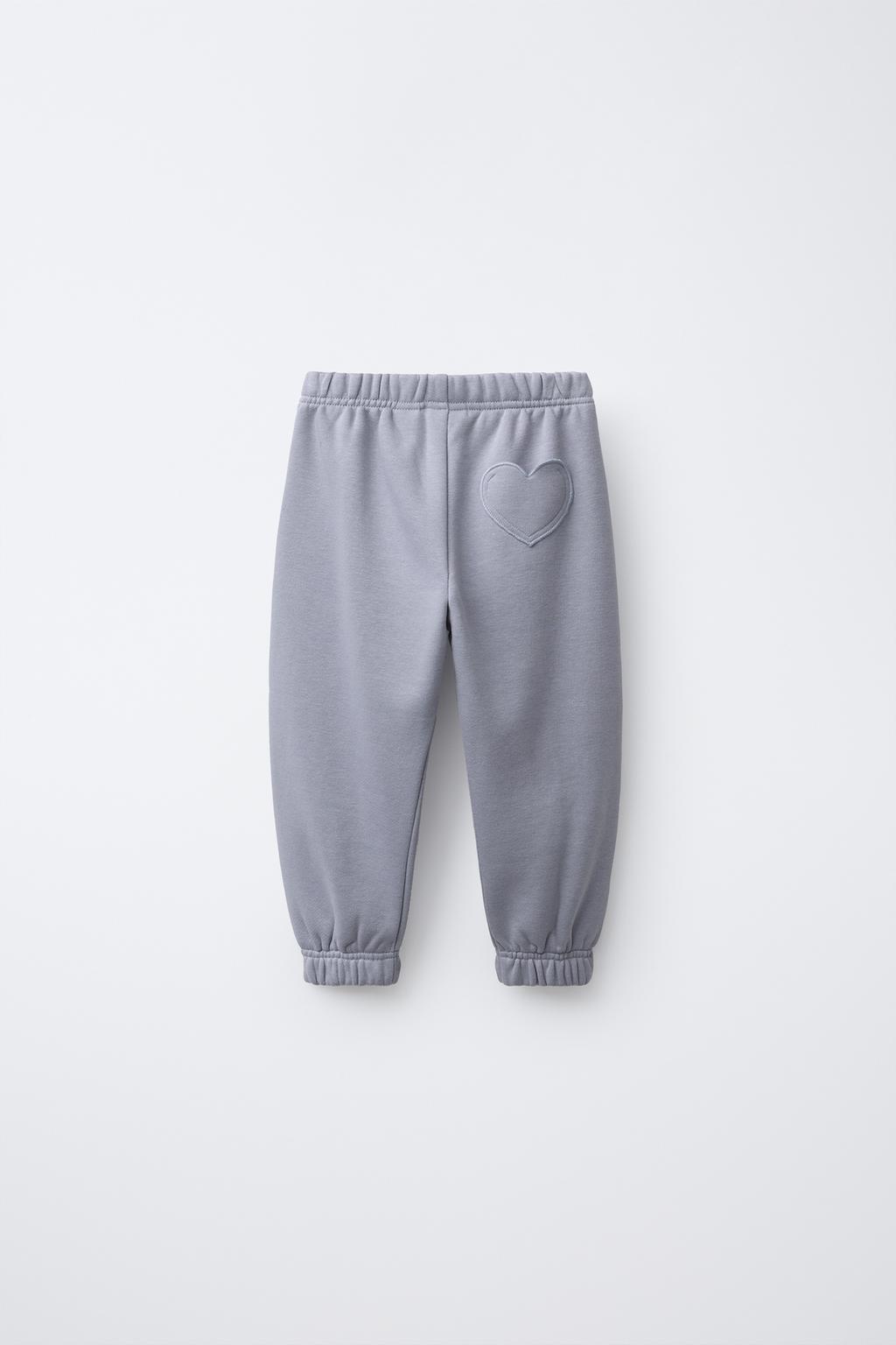 БРЮКИ-ДЖОГГЕРЫ С КАРМАНОМ-СЕРДЦЕМ