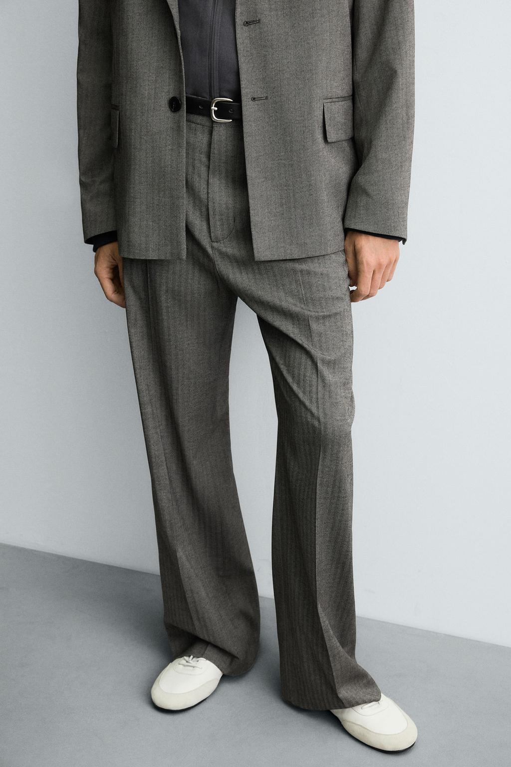 БРЮКИ FLARE FIT КОСТЮМНЫЕ В ЕЛОЧКУ