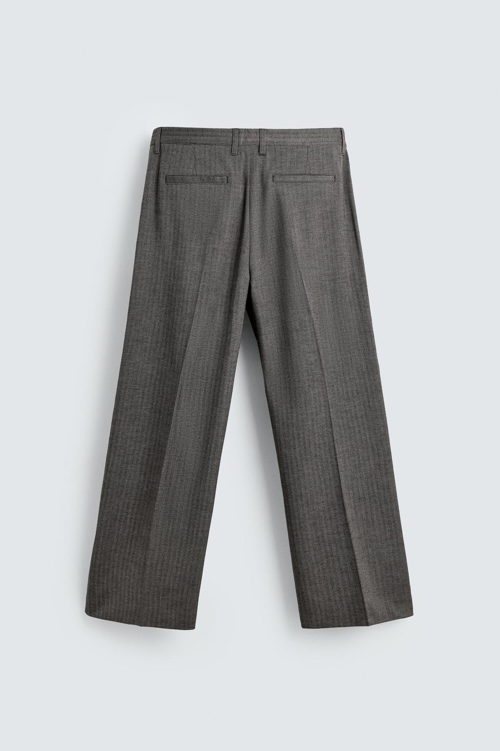 БРЮКИ FLARE FIT КОСТЮМНЫЕ В ЕЛОЧКУ
