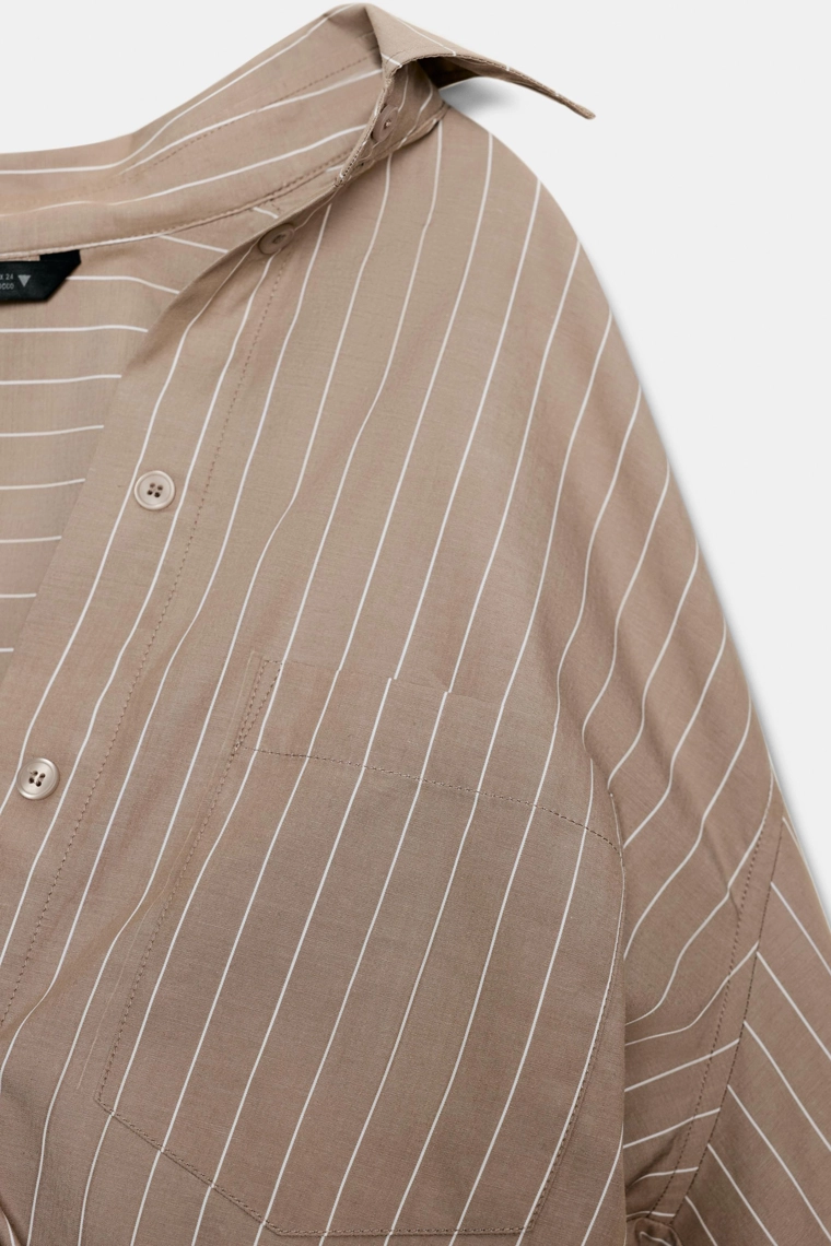 Платье в бежевых и электрических тонах