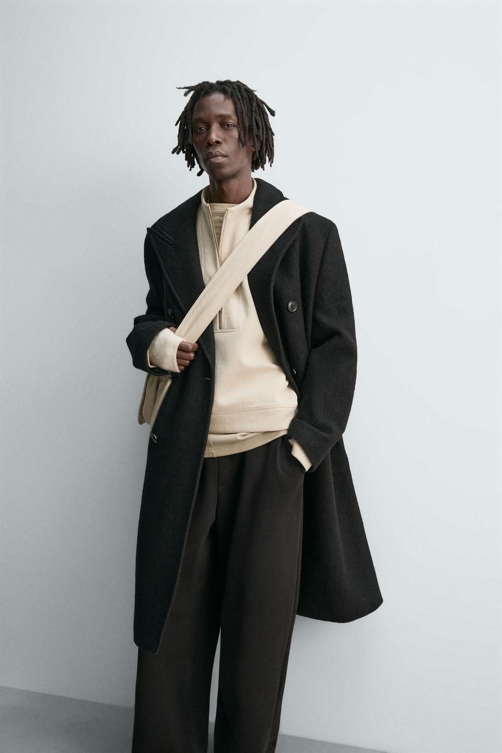 УКОРОЧЕННАЯ ТОЛСТОВКА ИЗ НЕОПРЕНА С ЗАКЛЕПКАМИ