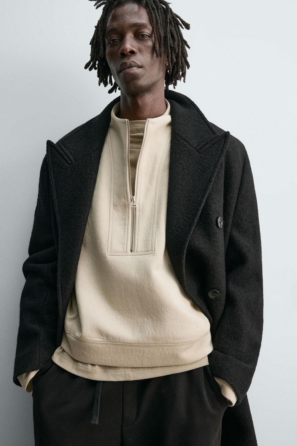 УКОРОЧЕННАЯ ТОЛСТОВКА ИЗ НЕОПРЕНА С ЗАКЛЕПКАМИ