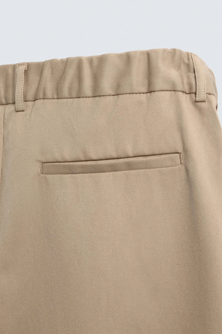 БРЮКИ RELAXED FIT СО СКЛАДКАМИ