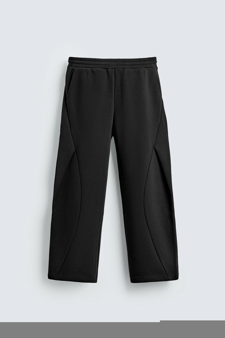 БРЮКИ BALLOON FIT ИЗ НЕОПРЕНОВОЙ ТКАНИ СО СКЛАДКАМИ