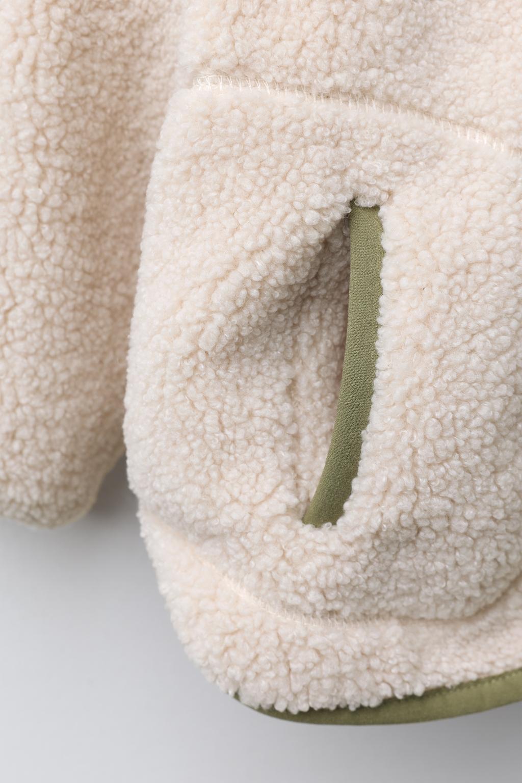 КУРТКА ИЗ ИСКУССТВЕННОЙ ОВЧИНЫ С ФЛИСОМ