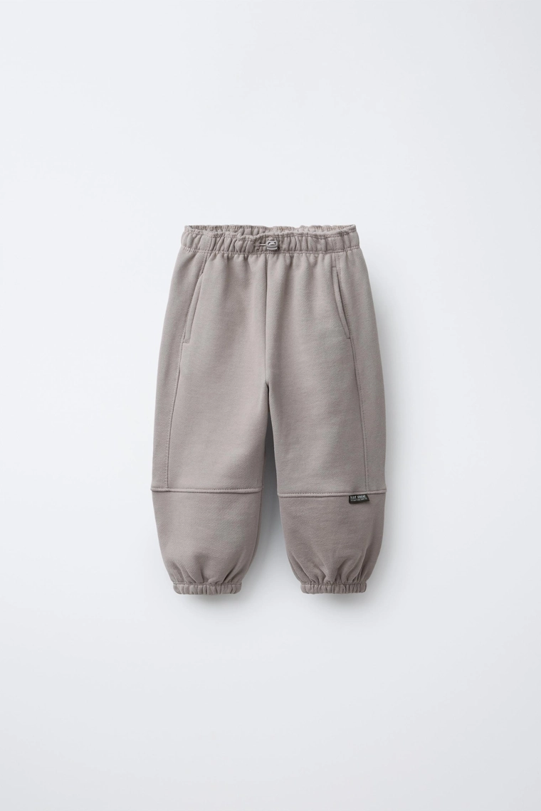 БРЮКИ-ДЖОГГЕРЫ С НАШИВКОЙ