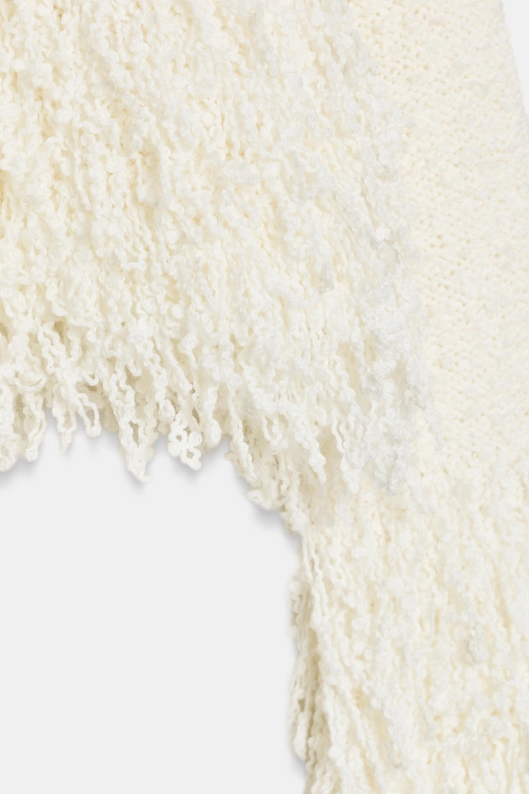 ТРИКОТАЖНЫЙ СВИТЕР С БАХРОМОЙ