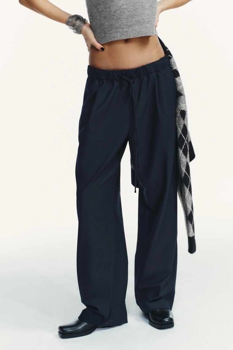 БРЮКИ С ЗАЩИПАМИ