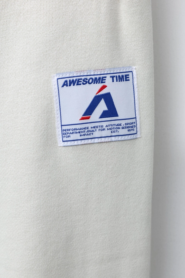 БРЮКИ-ДЖОГГЕРЫ С ЭТИКЕТКОЙ