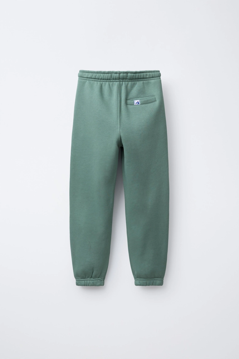 БРЮКИ-ДЖОГГЕРЫ С НАДПИСЬЮ