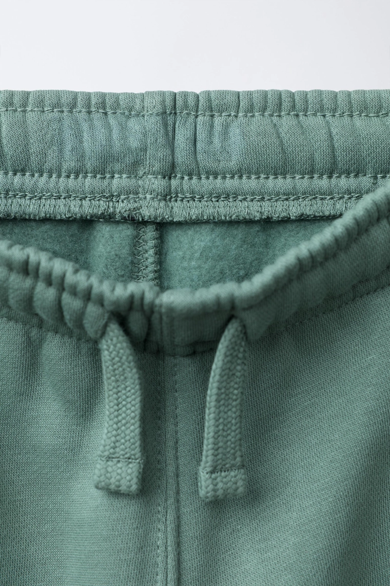 БРЮКИ-ДЖОГГЕРЫ С НАДПИСЬЮ