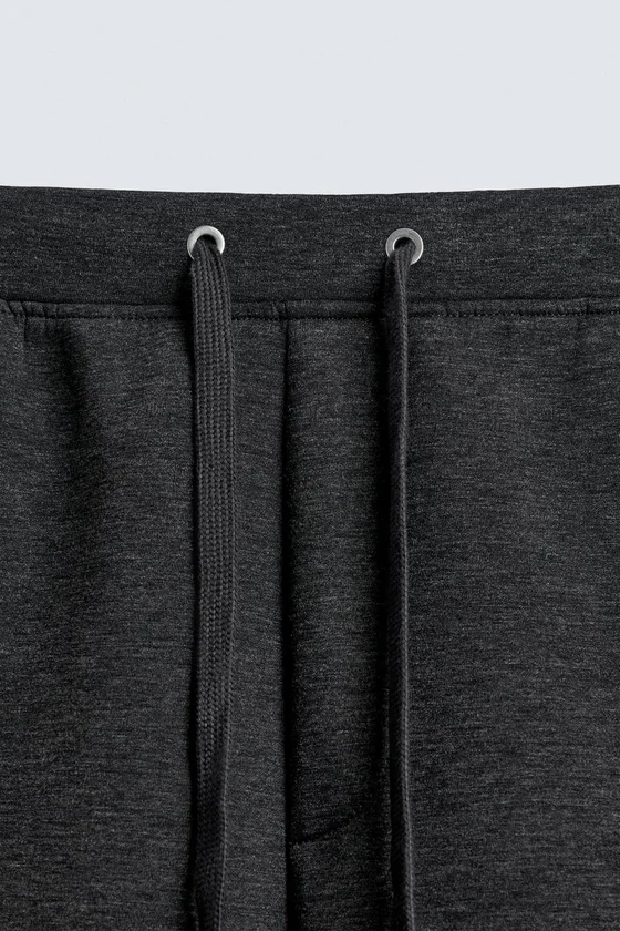БРЮКИ WIDE FIT С ЭФФЕКТОМ НЕОПРЕНА
