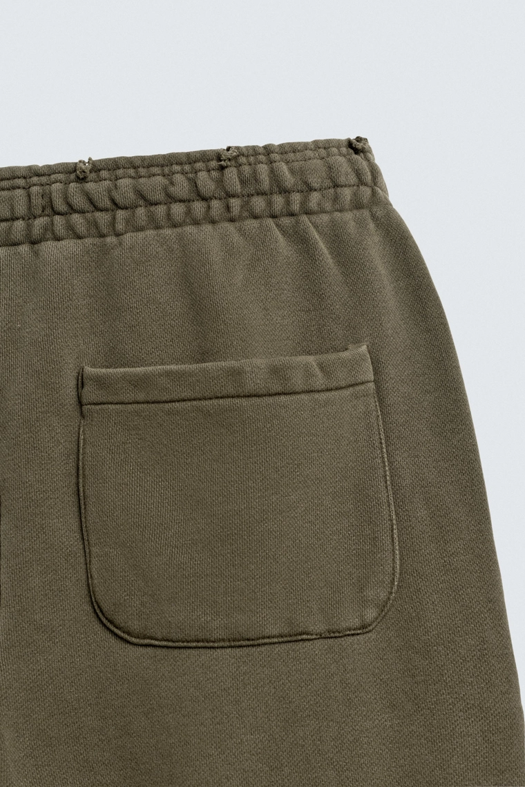 БРЮКИ RELAXED FIT С ЭФФЕКТОМ ПОТЕРТОСТИ