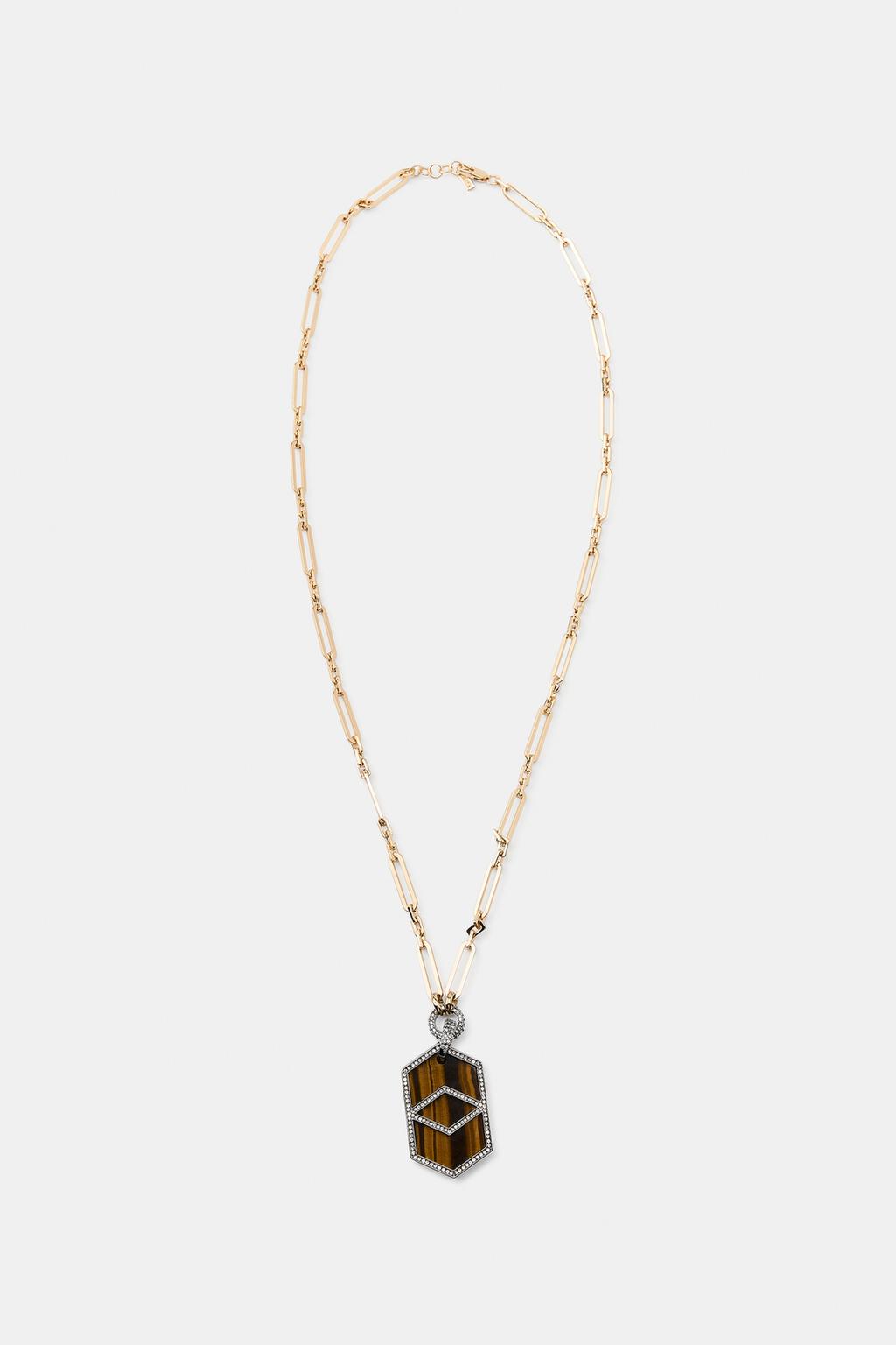 Ожерелье из металла с мерцающим камнем