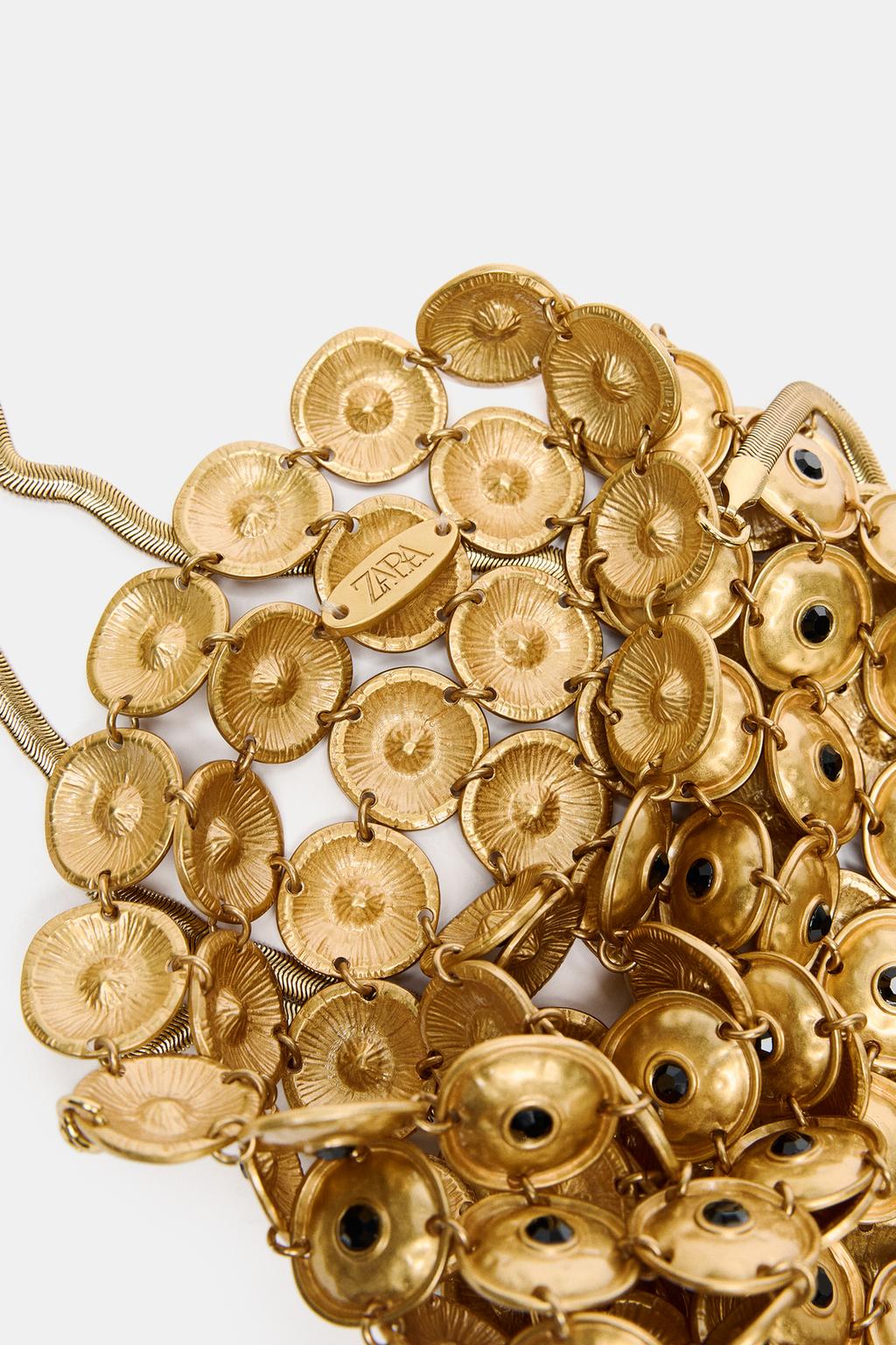 СУМКА-МЕШОК С МЕТАЛЛИЧЕСКИМИ ДЕТАЛЯМИ