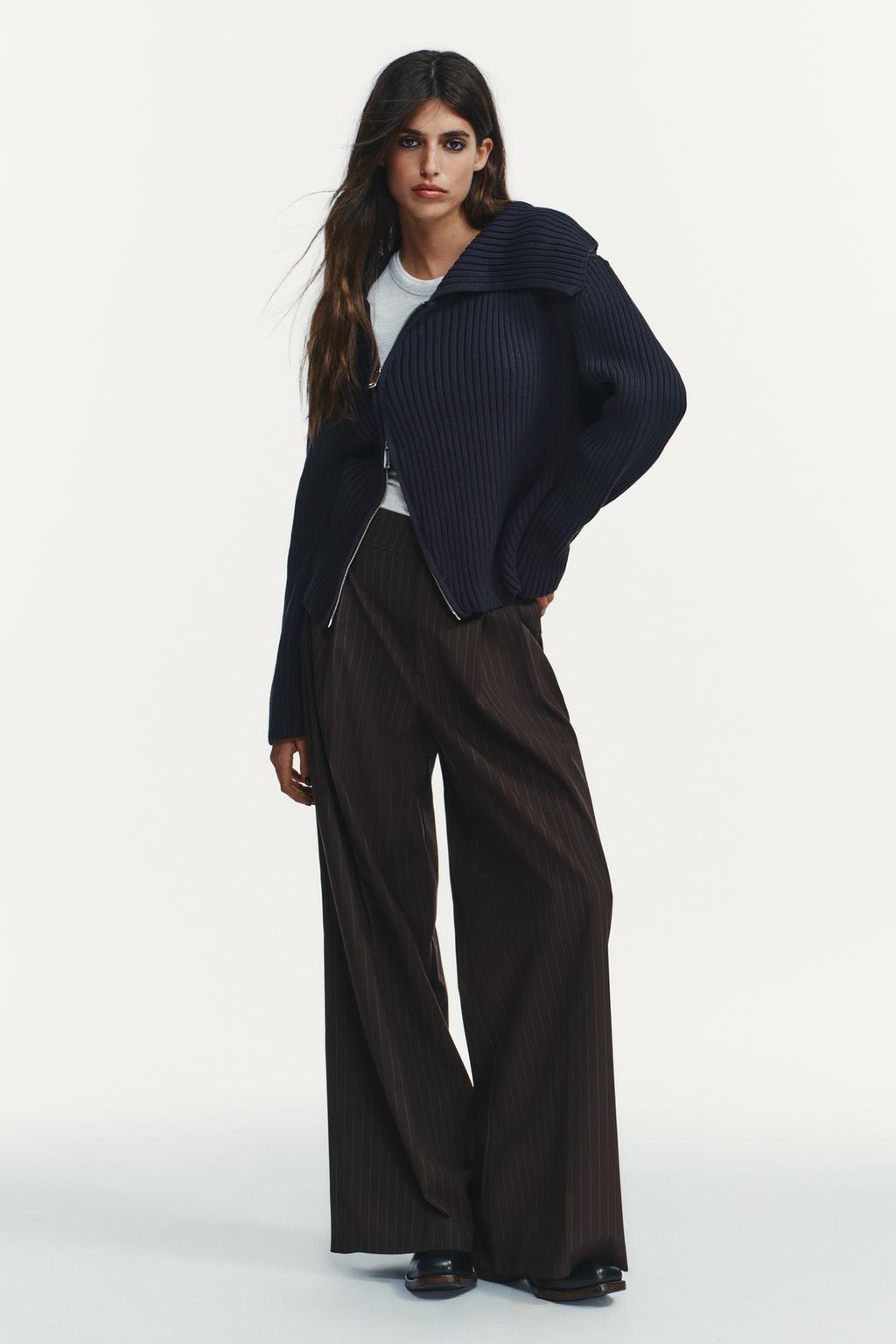 БРЮКИ С ЗАЩИПАМИ И КЛАПАНАМИ